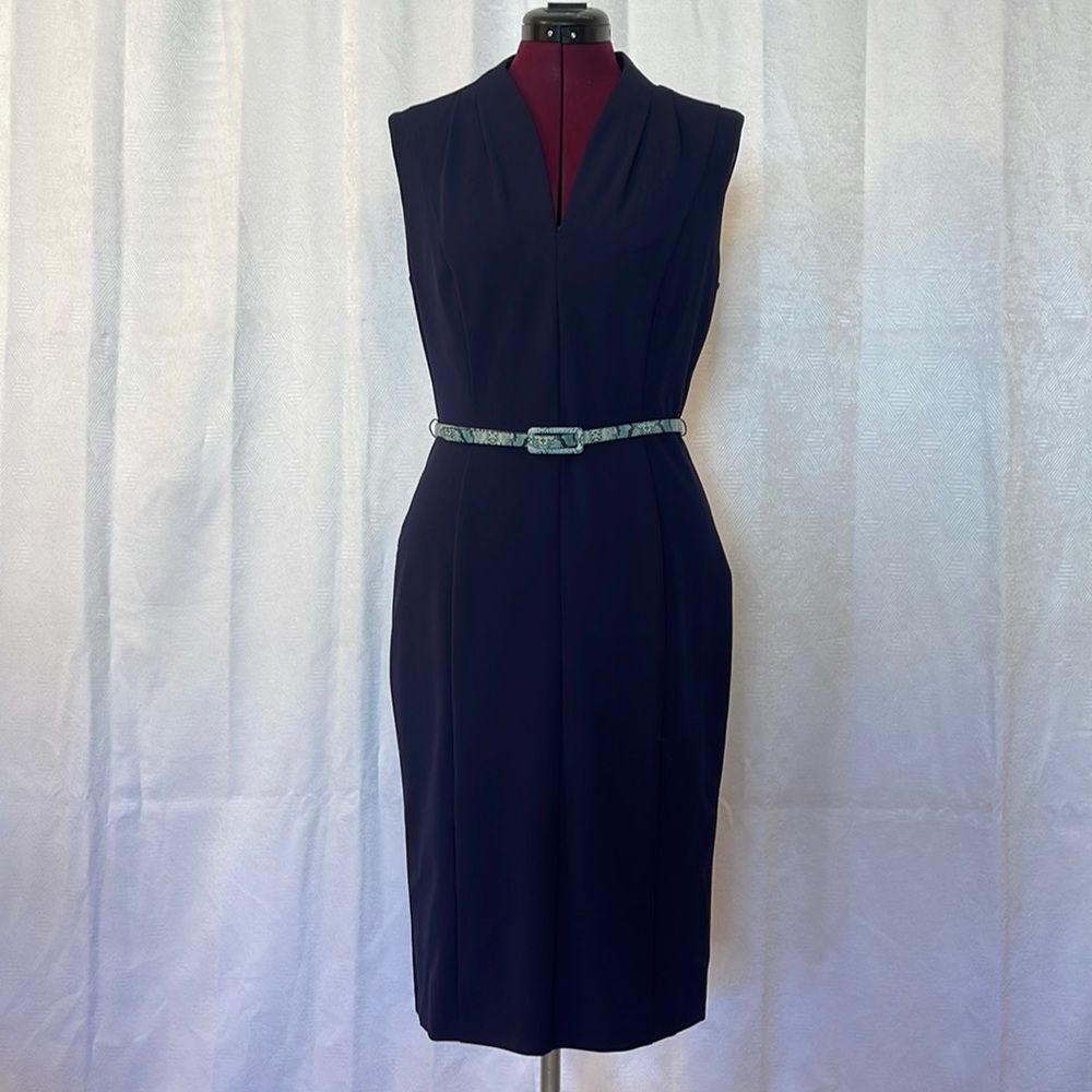 Navy blue form fitting dress.